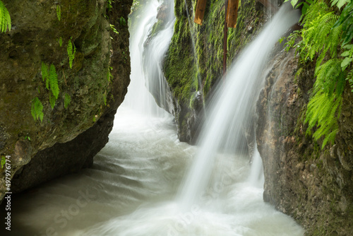 waterfall in the mountains of Chechnya in the spring in a picturesque forest