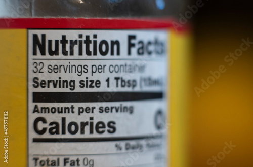 Nutrition facts label on a food product bottle