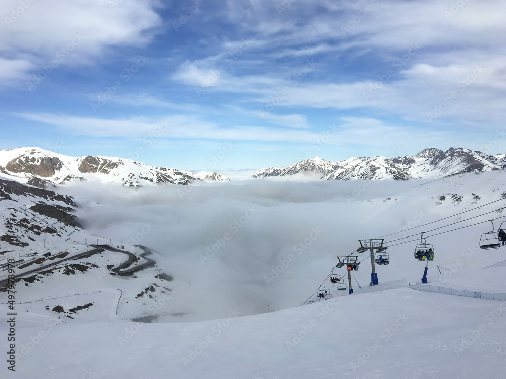 Snowy landscape with fog in a ski resort in the Pyrenees