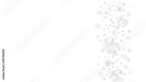 Snowflakes falling on white background. Horizontal Christmas and Happy New Year theme. Silver falling snowflakes for banner, gift card, party invitation, partner compliment and special business offers