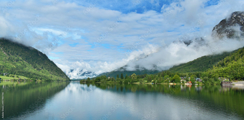 Lake Grundlsee, view of the surrounding mountains and nature with clouds, Eastern Alps, Liezen district in Styria, Austria, Europe.