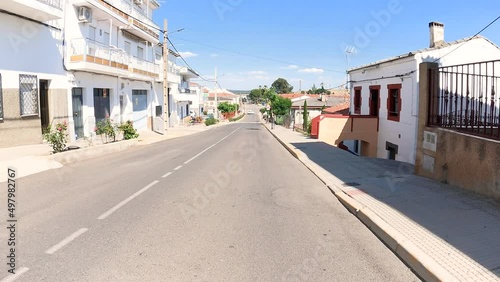 a paved road going through Galisteo town, province of Cáceres, Extremadura, Spain - dolly photo