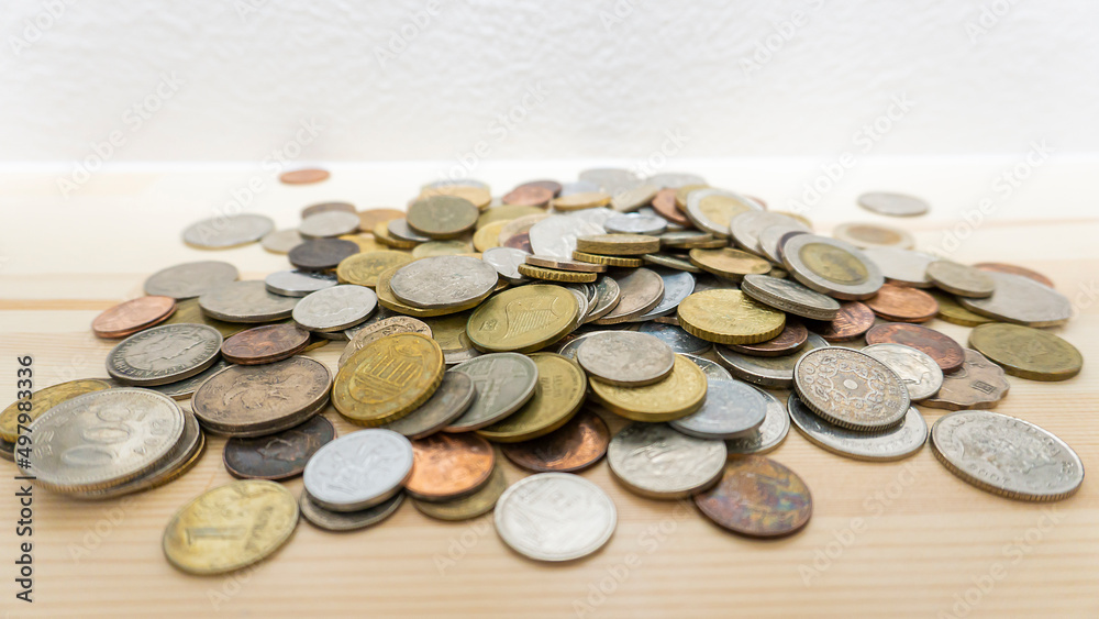 World coins piled up on the table_08