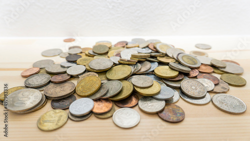 World coins piled up on the table_08