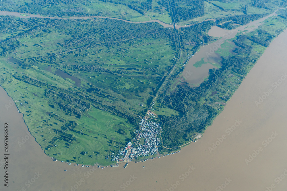Aerial photo showing urban center, riverfront and rural zone of Careiro