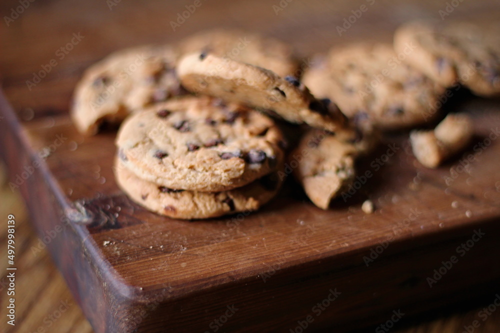 Delicious chocolate cookies placed on a wooden table Delicious chocolate cookies placed on a wooden table