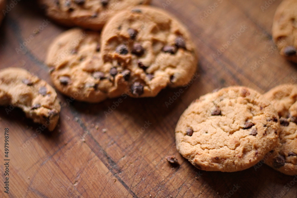 Delicious chocolate cookies placed on a wooden table Delicious chocolate cookies placed on a wooden table