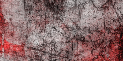 Red grunge texture background of cement plaster wall with cracks, red grunge wall texture. dark red grunge background. Horror Cement texture, wall full of scratches, Scary dark wall, grungy cement.