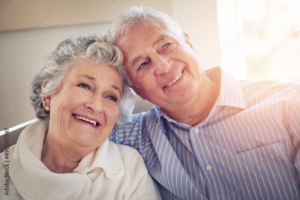 Reminiscing on all their wonderful experiences together. Cropped shot of a senior couple looking thoughtful at home. Reminiscing on all their wonderful experiences together. Cropped shot of a senior couple looking thoughtful at home.