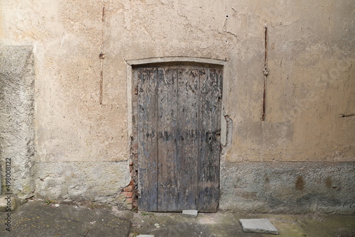 an old wooden entrance door © maho