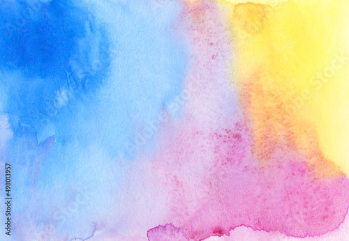 Watercolor pastel colorful background texture. Watercolour blue, pink, yellow backdrop. Stains on paper, hand painted.