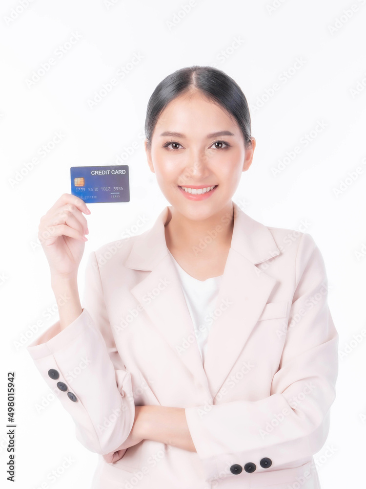 Business Asian woman showing credit card for payment shopping online , paying by credit card online shopping e-commerce telemarketing concept Business Asian woman showing credit card for payment shopping online , paying by credit card online shopping e-commerce telemarketing concept