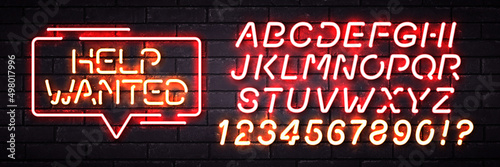 Vector realistic isolated neon sign of Help Wanted with easy to change alphabet font on the wall background.