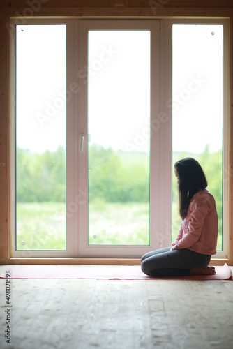 The girl in yoga on the rug Free Download The girl in yoga on the rug - GFXLoad