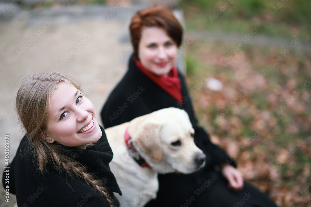 Young girl on a walk in the autumn Young girl on a walk in the autumn