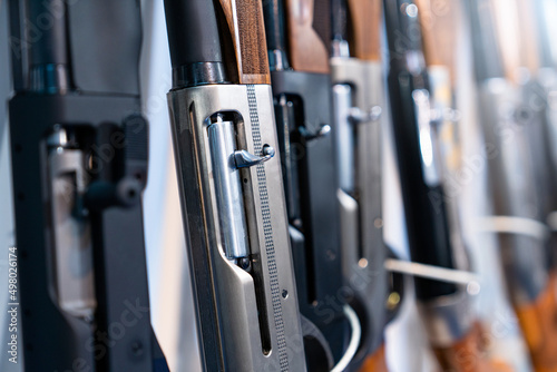 Close-up of guns in a row photo
