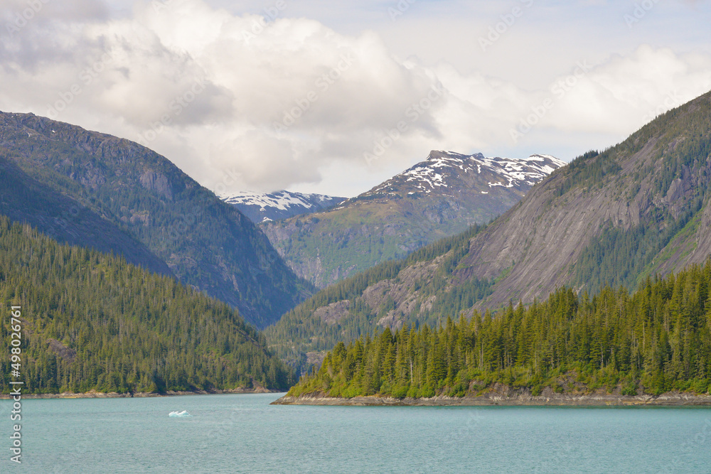 Beautiful mountain views over Alaska from cruise ship as it sails taking guests to view sites they would never have seen from the land.