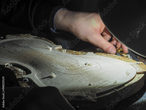 Obraz na plátně luthier working on a new violin in his workshop