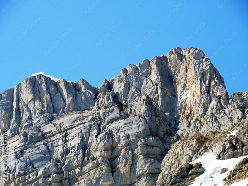 Rocky peak Mutteristock (2295 m) in the in the Schwyz Prealps mountain range, and over the Wägitalersee reservoir lake (Waegitalersee or Wagitaler lake) - Canton of Glarus, Switzerland (Schweiz) Rocky peak Mutteristock (2295 m) in the in the Schwyz Prealps mountain range, and over the Wägitalersee reservoir lake (Waegitalersee or Wagitaler lake) - Canton of Glarus, Switzerland (Schweiz)