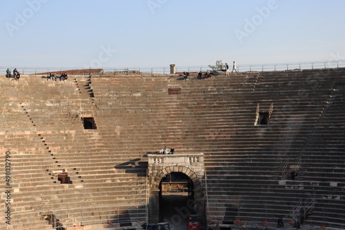 Verona, Italy- March 19, 2022: Inside Arena of Verona, ancient roman amphitheatre. Blue sky in the background. Detailed photography of the old architecture. 
