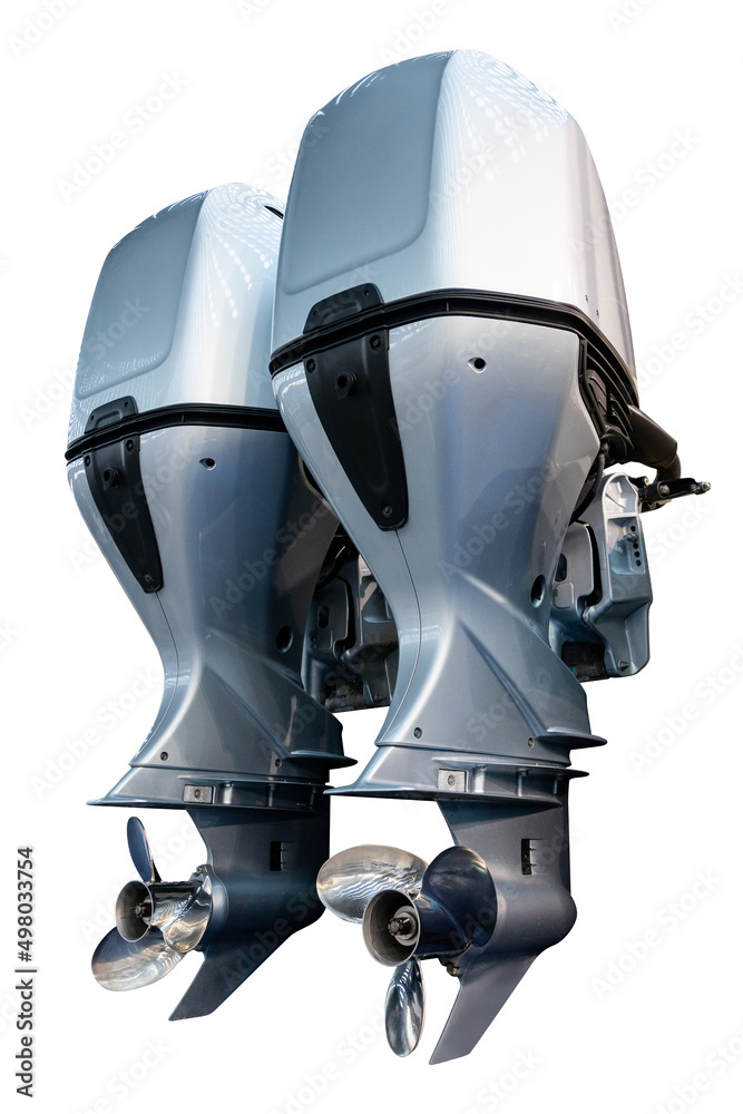 Two outboard motors for a speed boat isolated on white background Two outboard motors for a speed boat isolated on white background
