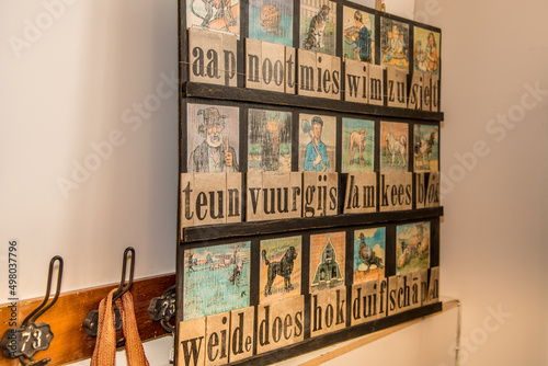 Hoorn, Netherlands, March 2022. Old-fashioned reading board of the Dutch language from the 1950s. photo
