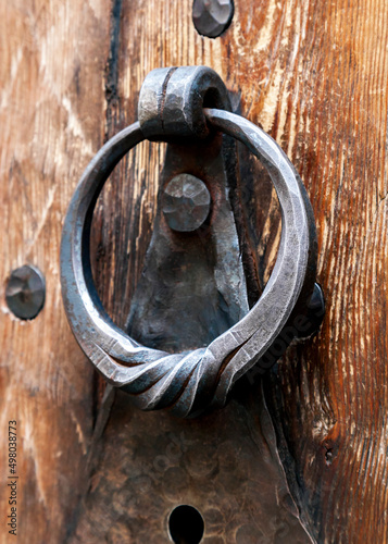 Fototapeta Naklejka Na Ścianę i Meble -  Old door knocker on a wooden door