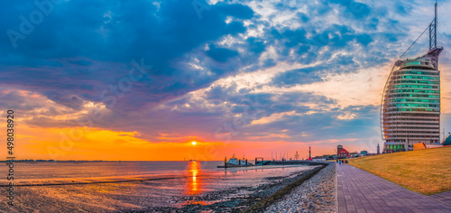Sunset with clouds and ship in Bremerhaven	 photo