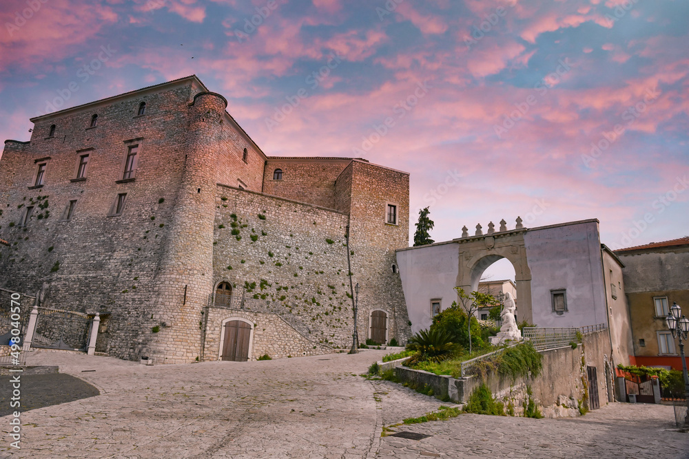 The castle of Montemiletto and the entrance arch in the Italian village. It is located in the Campania region.