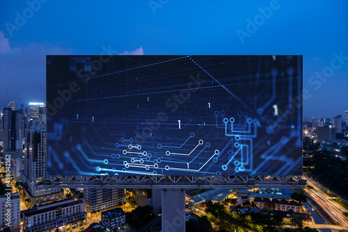 Photography Information flow hologram on road billboard, night panorama city view of Kuala Lumpur