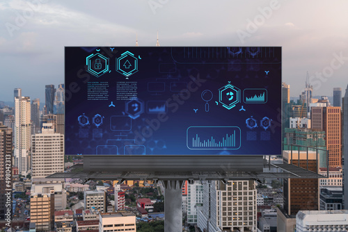 Photography Glowing hologram of technological process on billboard, aerial panoramic cityscape of Kuala Lumpur at sunset