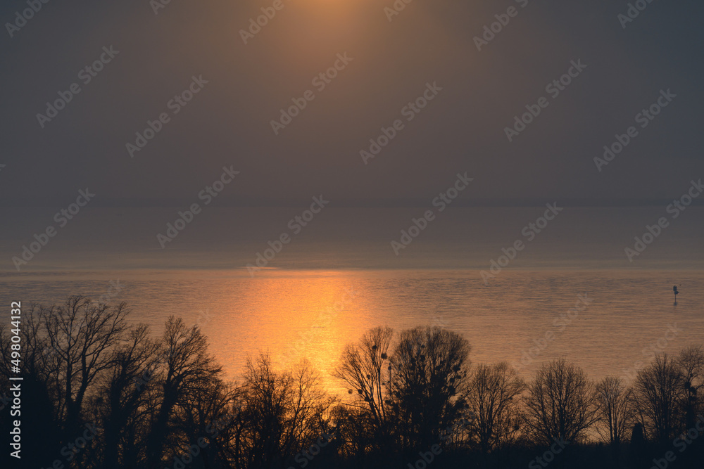 Golden light on blue lake