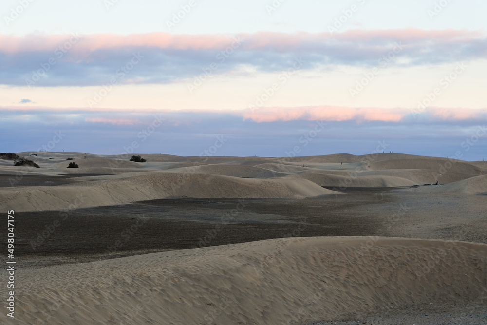 sand dunes at sunset