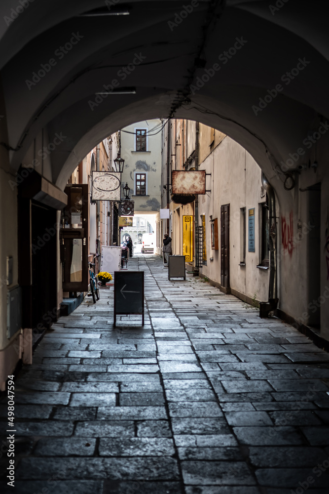 Fototapeta premium Narrow Alley In The Inner City Of Budweis (Ceske Budejovice) In The Czech Republic