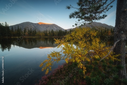 reflection of mountains in a mountain lake © Мария Быкова