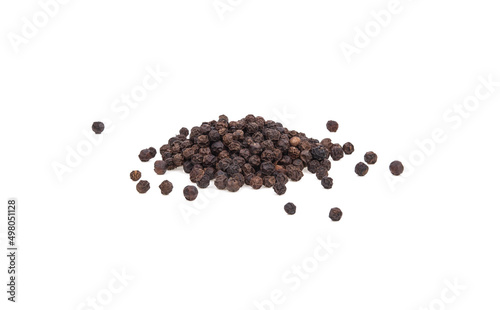Pile of Black peppercorns (Black pepper) seeds isolated on white background.