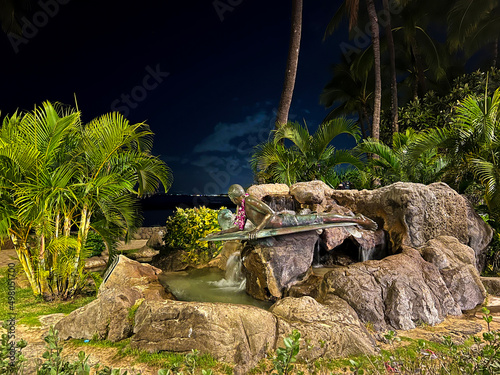 park, natural place, palm trees, statue, creational stone in tropical park