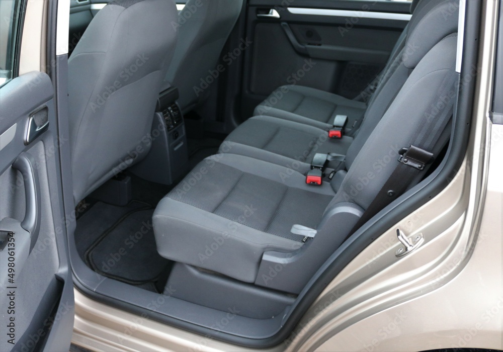 Auto interior with back seats.