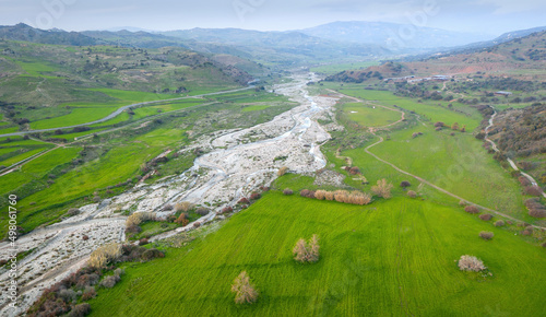 Diarizos river and green fields in springtime. Cyprus drone landscape photo