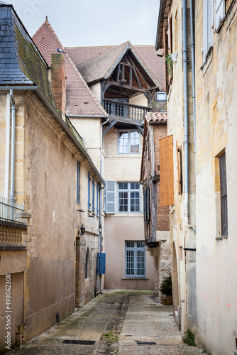 Face of medieval houses in a narrow street of a typical french medieval village and city  bergerac  in France  in the region of Dordogne and Perigord  with typical of Southwestern French architecture