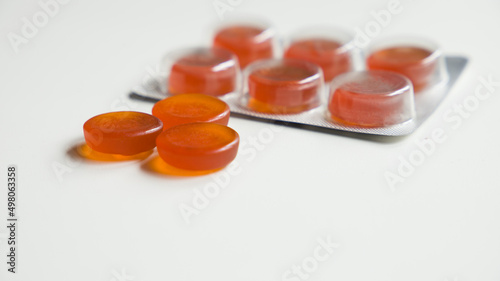 orange and honey flavored throat lozenges photo