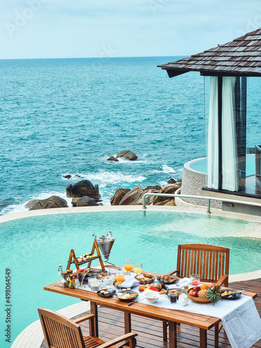 Vacation brunch food table at luxury restaurant hotel suite private
