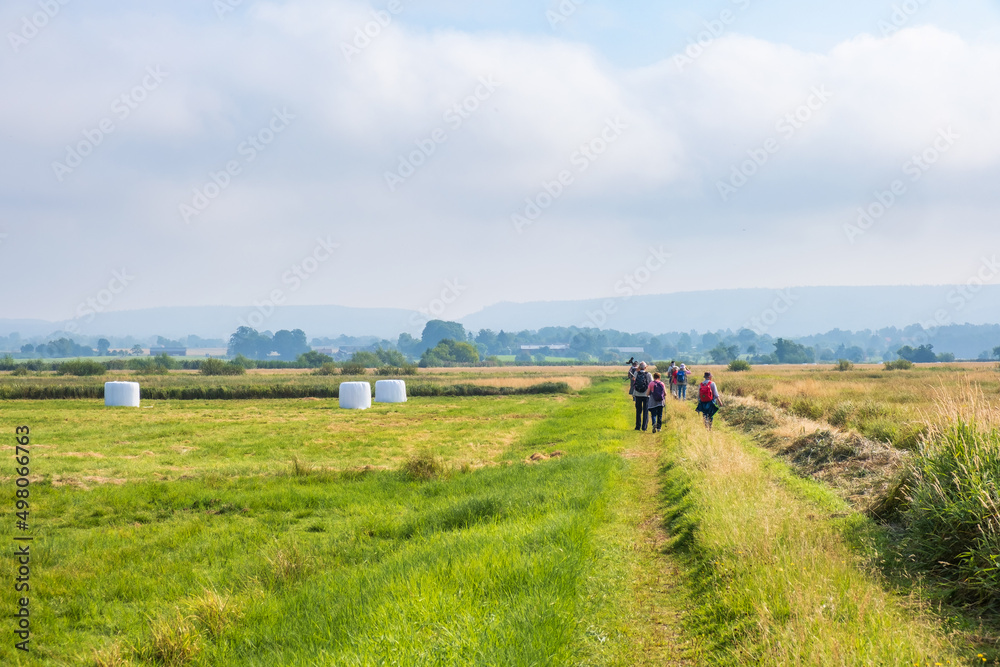 Fototapeta premium Group of people on an excursion in the countryside