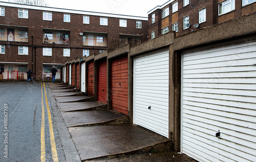 Quadro su tela Rows of garages and social housing on a Northern council estate in UK