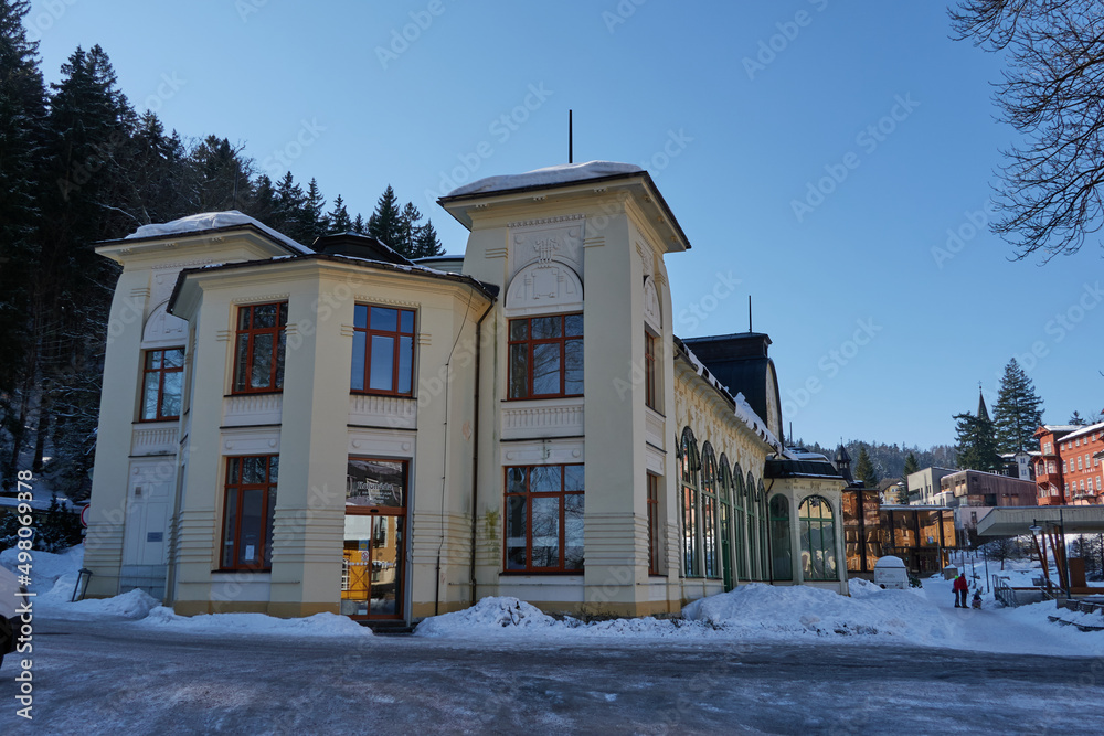 Janske Lazne, Czech Republic - February 13, 2022 - The park in front of the colonnade on a sunny winter day  