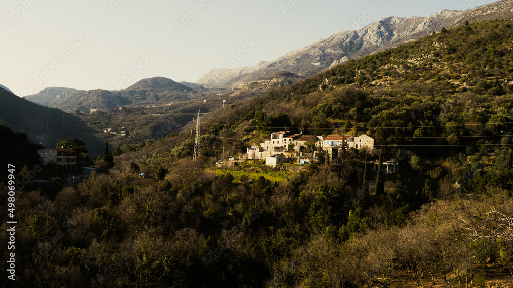 Fototapeta premium The estate is high in the mountains. The house stands on a mountain. Life in the mountains