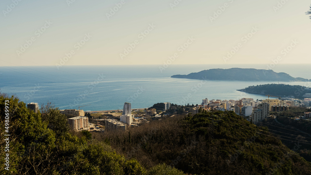 Mountain landscape with a view of the sea riviera and the coastal city. The photo was taken high in the mountains