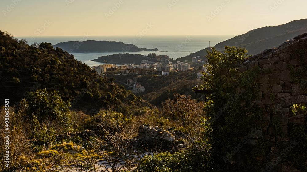 Mountain landscape with a view of the sea riviera and the coastal city. The photo was taken high in the mountains