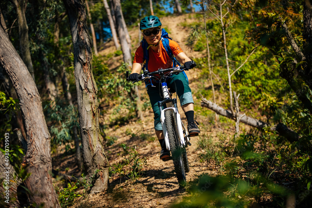 Mountain biking in spring forest