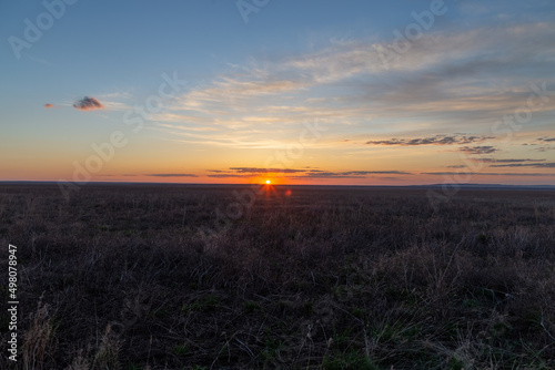 Sunset in the Burtinskaya steppe (Orenburg nature reserve). Orenburg region, Southern Urals, Russia.